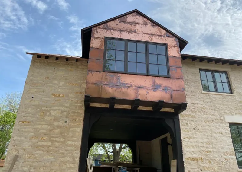 Copper metal panel facade on a stone building for Metal Roof Coating in Hacienda Heights